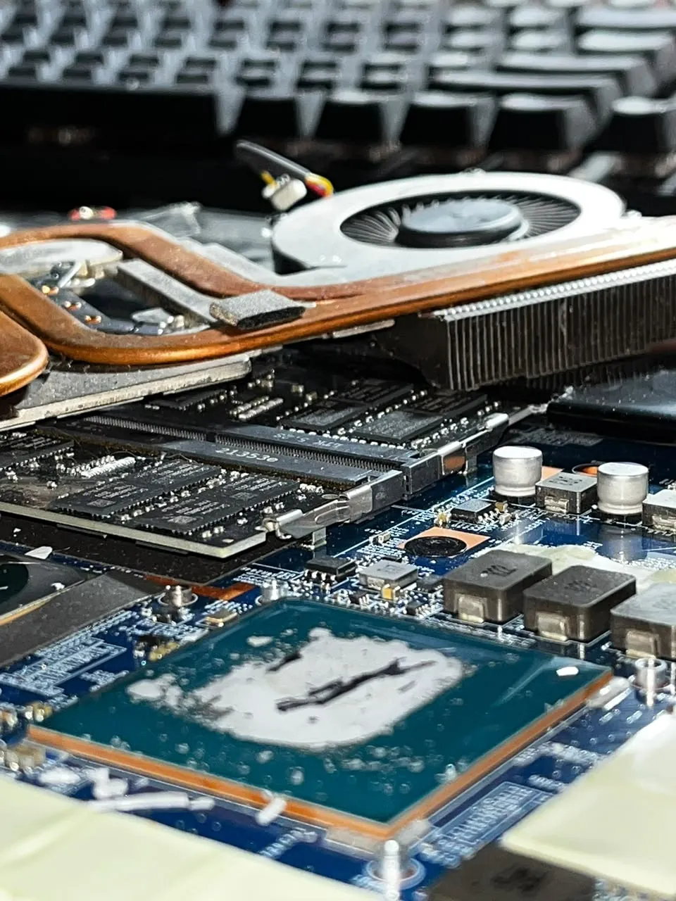 Internal cooling components and RAM slots
